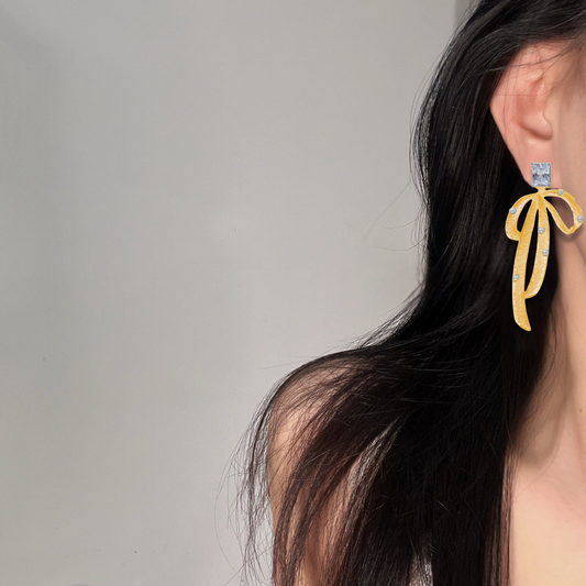 Dazzling Bow & Pearl Drop Earrings