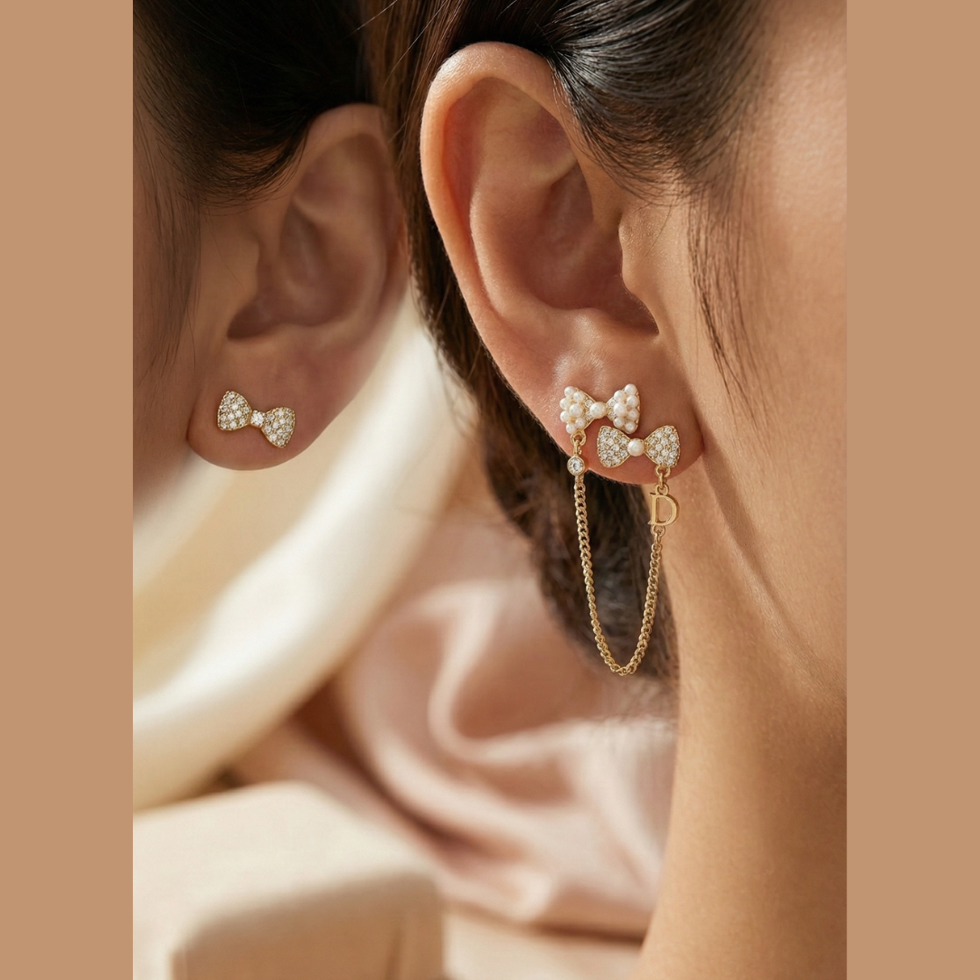 Asymmetrical Pearl Bow Drop Earrings