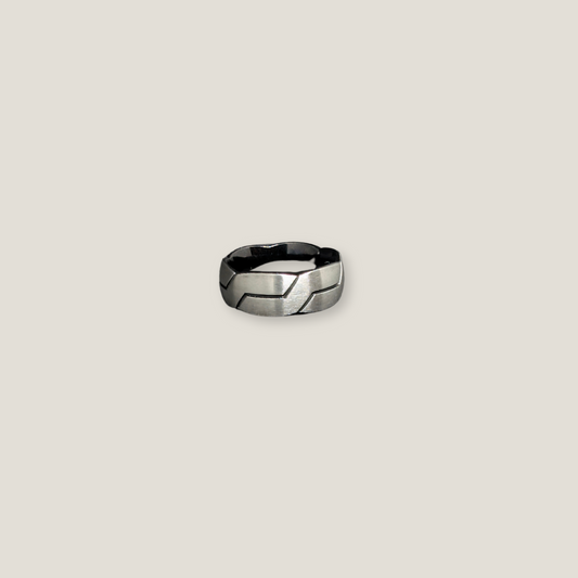 Segmented Steel: Textured Puzzle Ring for Him