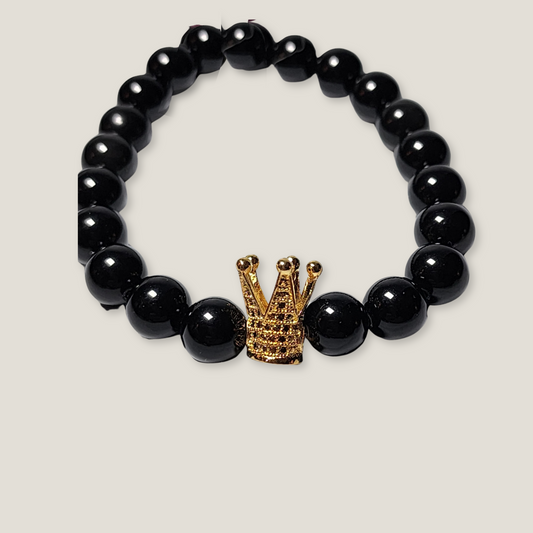 The Sovereign Bead: Black Onyx Bracelet with Golden Crown